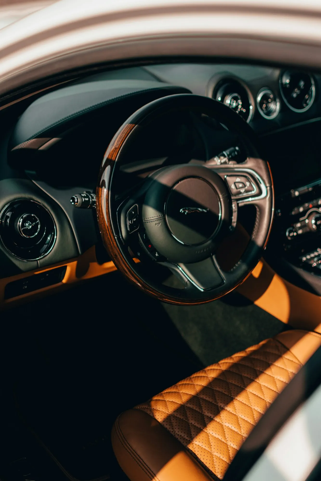 The quilted leather interior of a long-distance executive vehicle