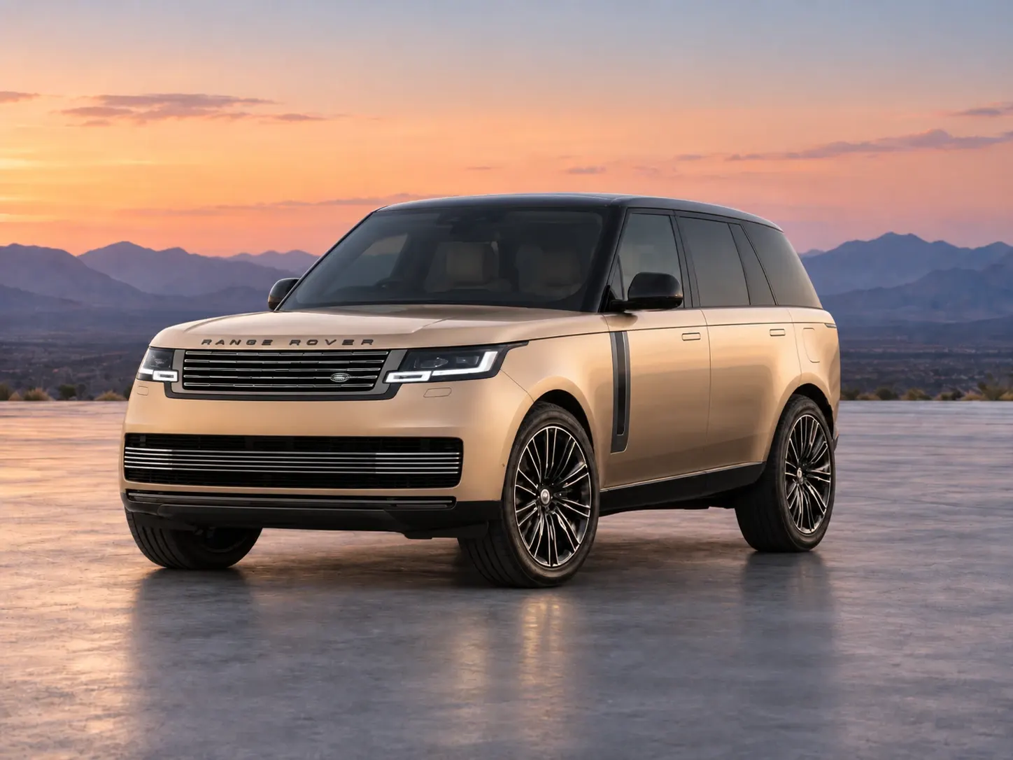 A Range Rover premium SUV in a light metallic finish, front three-quarter view